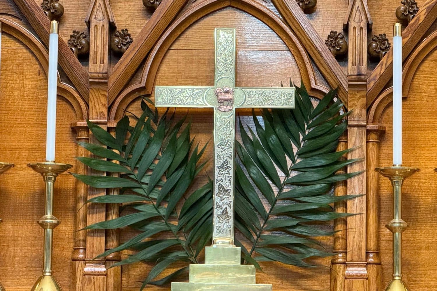 Cross and Palm Leaves during Palm Sunday Celebration